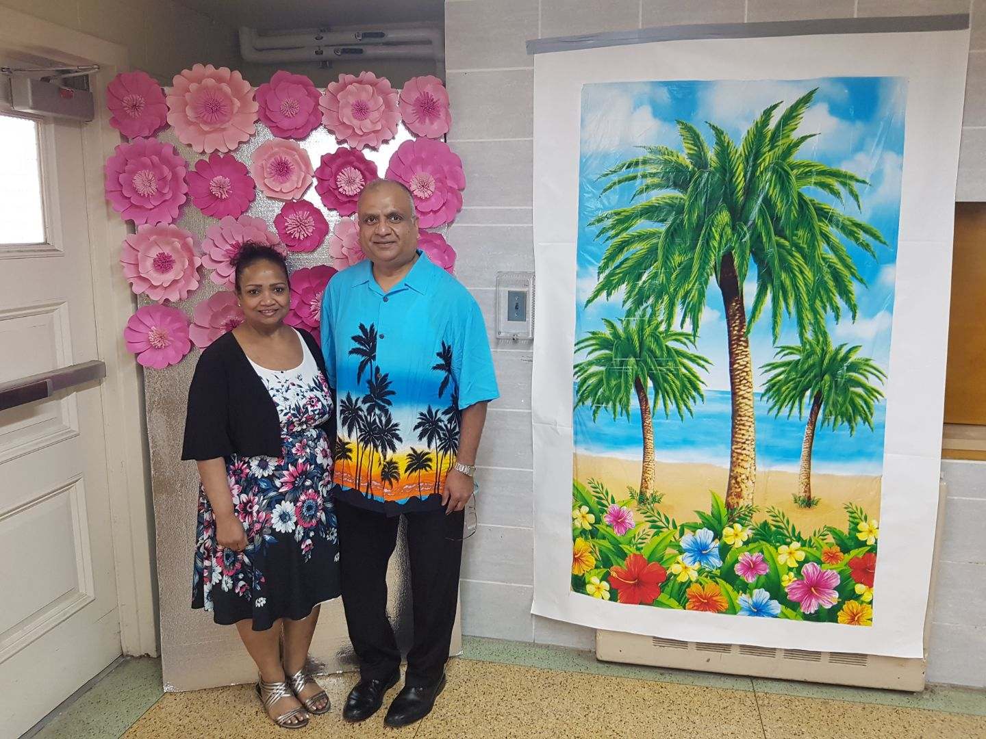 couple in front of backdrop