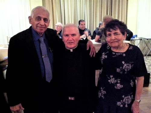 Reg & Shirley Digby with Father Grima in 2016