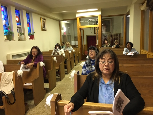 picture of the rosary group praying in the chapel