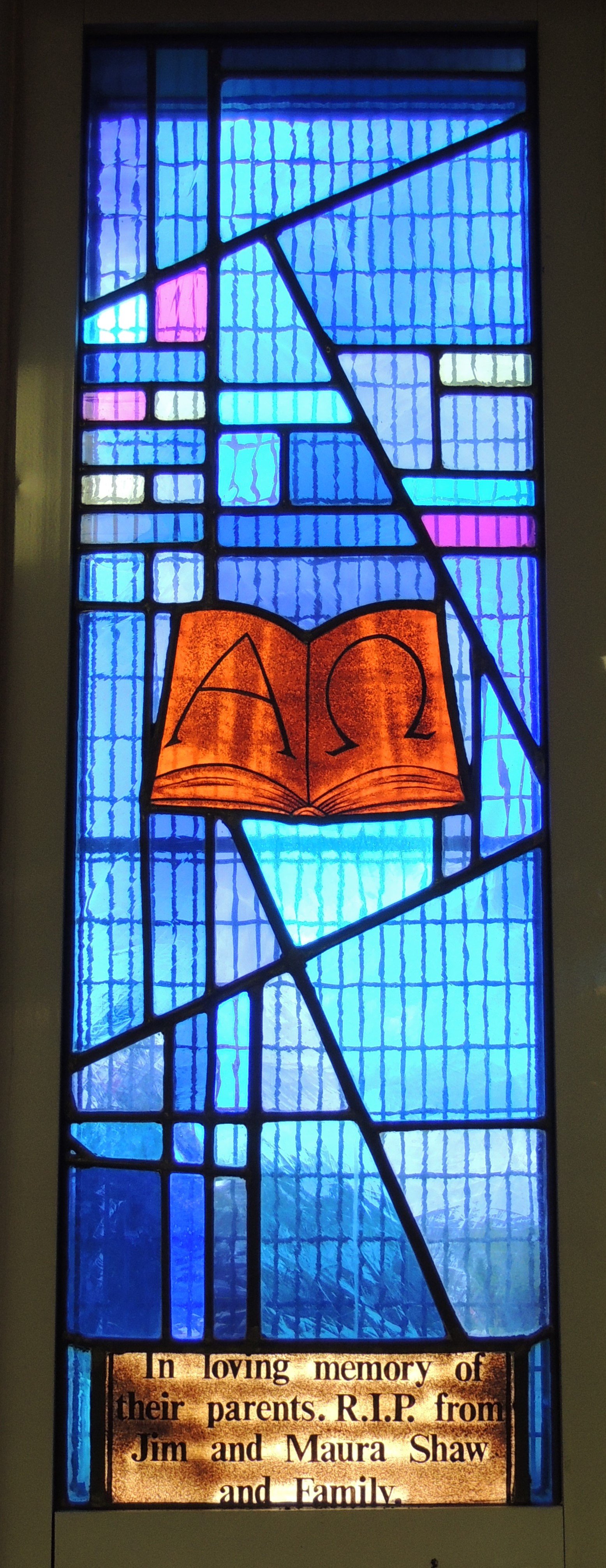 Alpha and Omega letters - stained glass window